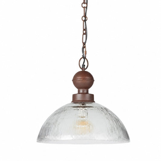 Ribbed clear glass dome pendant on rust brown chain with warm lit bulb