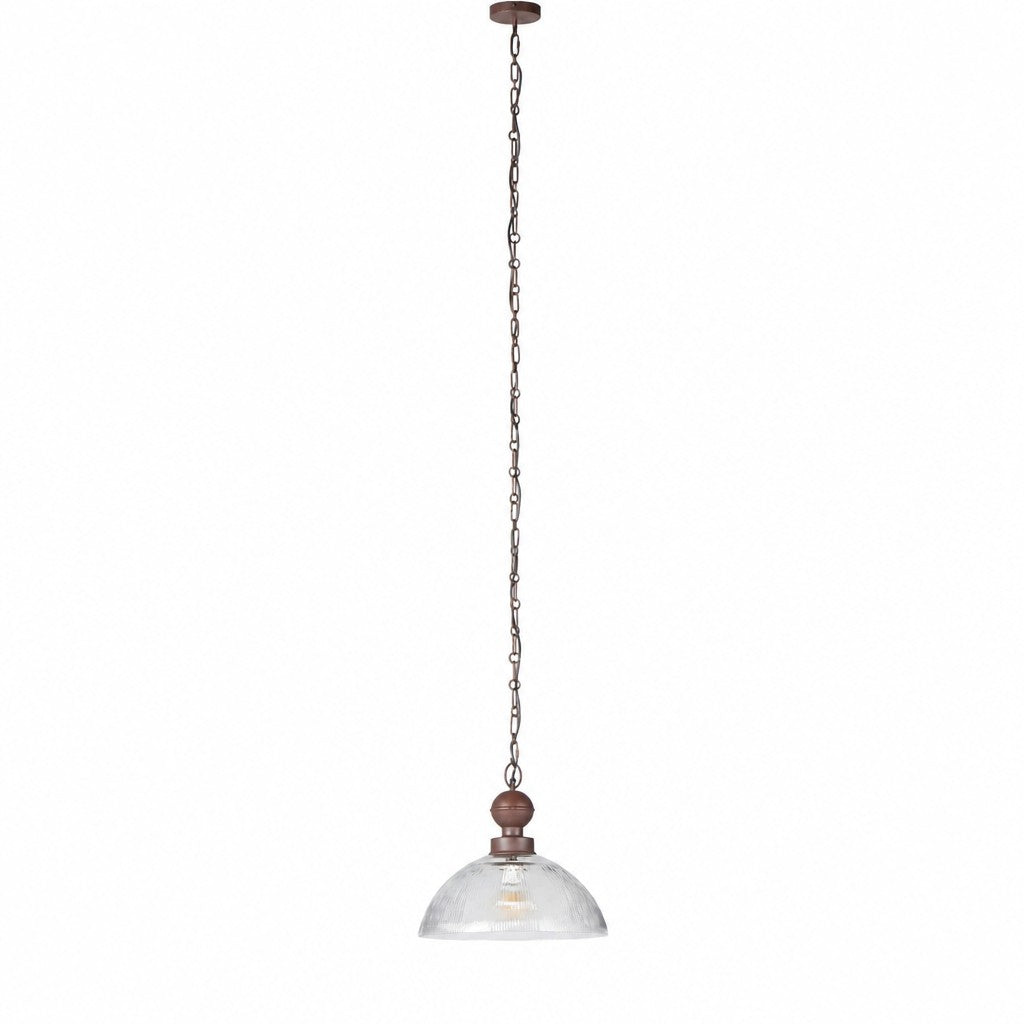 Full length view of long rust chain dropping from ceiling to fluted glass dome