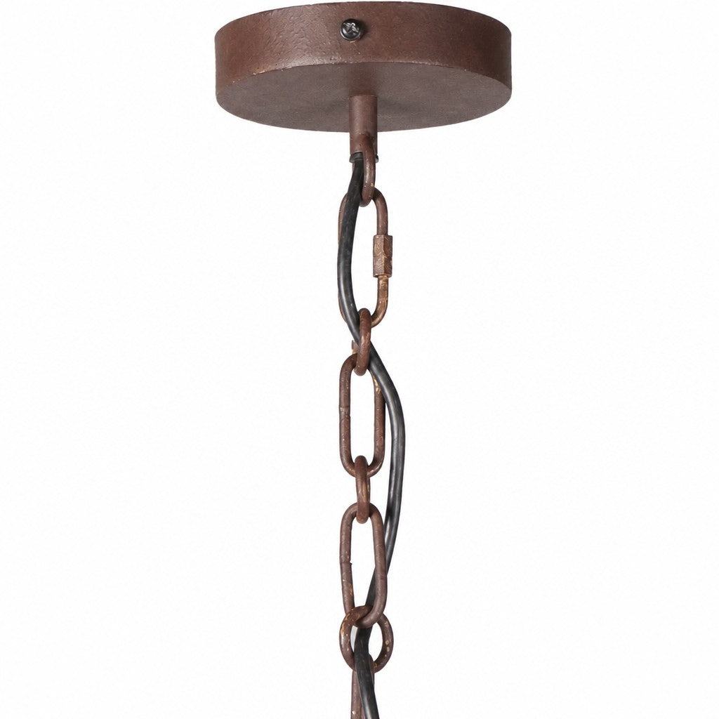 Close-up of round rust brown ceiling canopy with chain links and cord