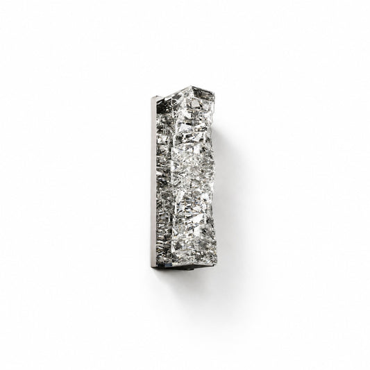 Unlit crystal block wall sconce with polished chrome backplate on plain white studio background