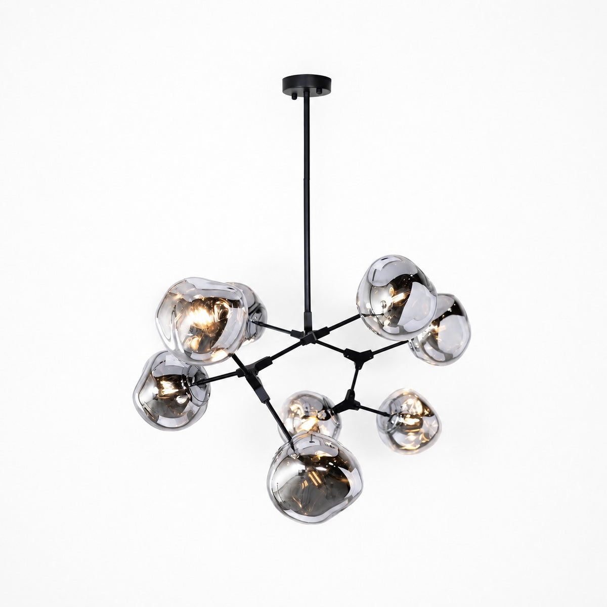 Compact branching pendant with smoked acrylic globe shades on a matte black stem