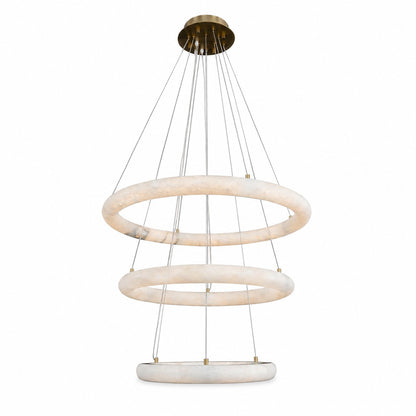 Angled view of tiered alabaster hoop chandelier, warm veined stone and brass fittings